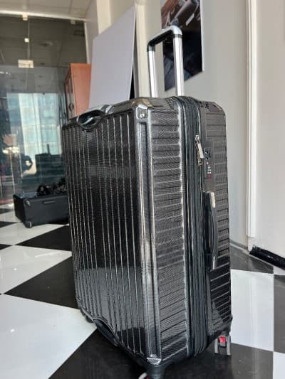 VALISE DE VOYAGE CARBON حقيبة سفر سوداء بتصميم كربون