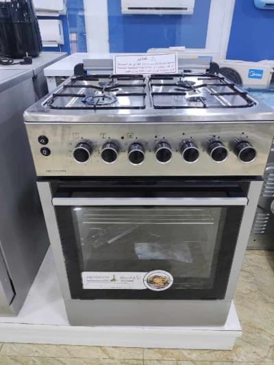 Cuisinière arcodym 4 feux inox ventilé