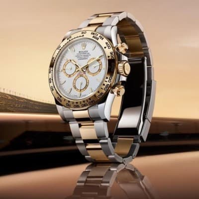 Montre Rolex Daytona gold silver